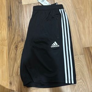 Brand new men’s athletic shorts. Size large adidas brand